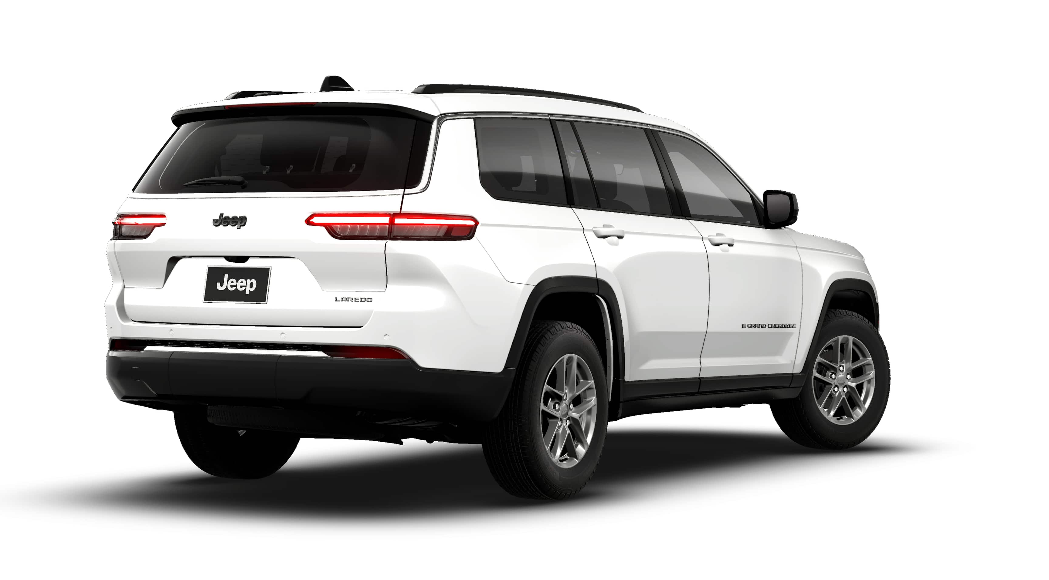 2026 Jeep Grand Cherokee GRAND CHEROKEE L LAREDO 4X2 in Bright White Clear-Coat Exterior Paint — front three-quarter view