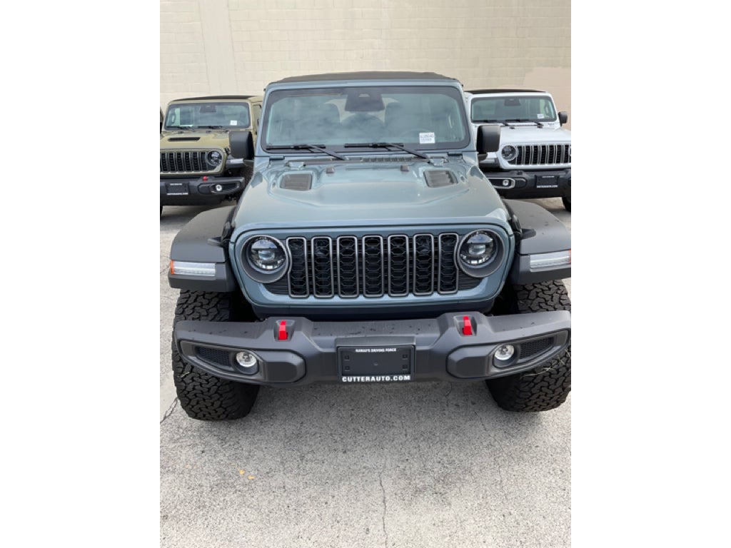 2026 Jeep Wrangler WRANGLER 4-DOOR RUBICON in Anvil Clear-Coat Exterior Paint — front three-quarter view