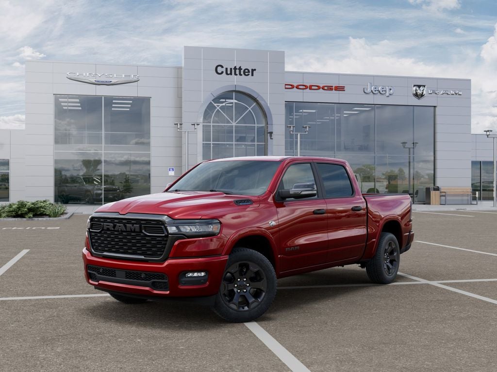 2026 RAM Ram 1500 RAM 1500 BIG HORN CREW CAB 4X2 5'7' BOX in Molten Red Pearl-Coat Exterior Paint — front three-quarter view