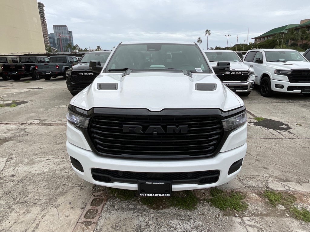 2026 RAM Ram 1500 RAM 1500 LARAMIE CREW CAB 4X2 5'7' BOX in Bright White Clear-Coat Exterior Paint — front three-quarter view