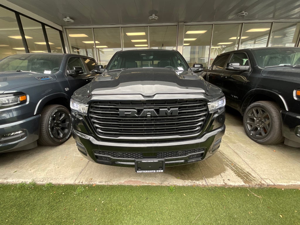2026 RAM Ram 1500 RAM 1500 LARAMIE CREW CAB 4X2 5'7' BOX in Diamond Black Crystal Pearl-Coat Exterior Paint — front three-quarter view