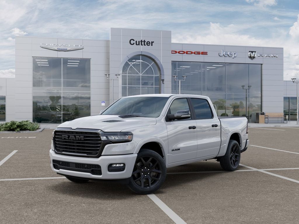2026 RAM Ram 1500 RAM 1500 LARAMIE CREW CAB 4X4 5'7' BOX in Bright White Clear-Coat Exterior Paint — front three-quarter view
