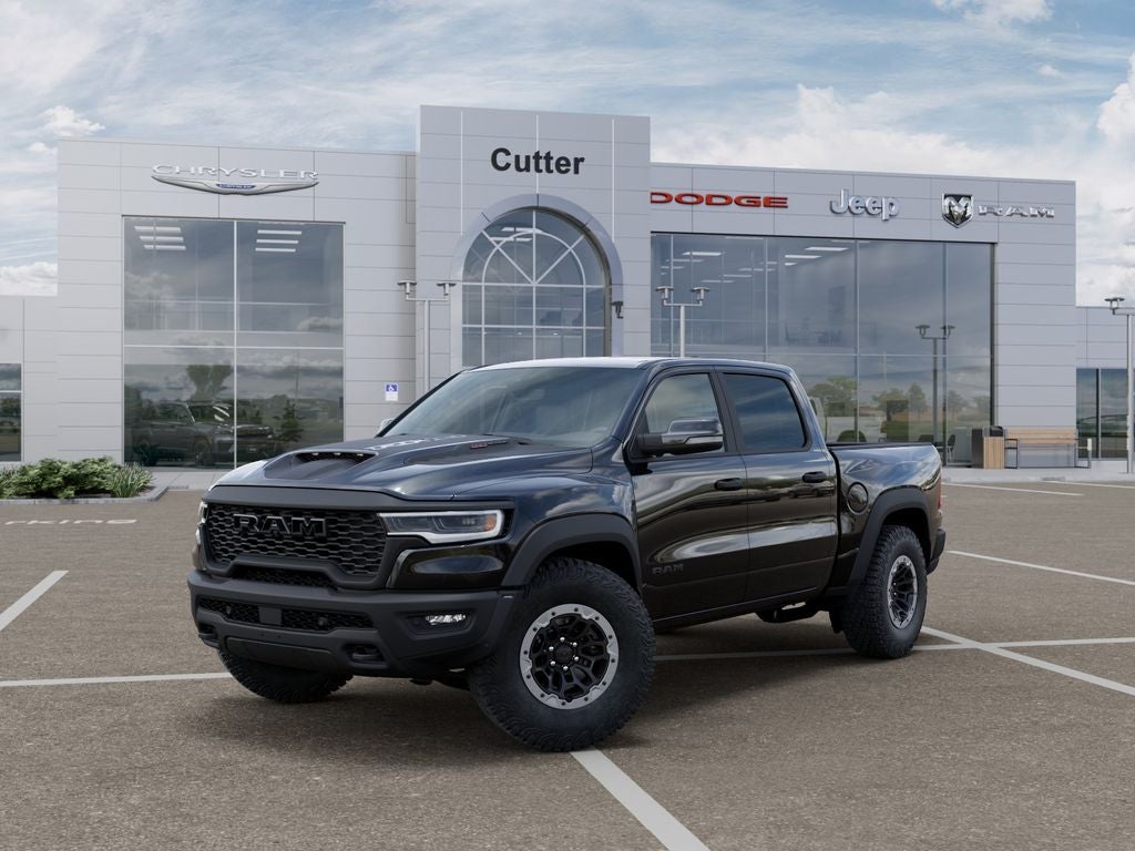 2026 RAM Ram 1500 RAM 1500 RHO CREW CAB 4X4 5'7' BOX in Diamond Black Crystal Pearl-Coat Exterior Paint — front three-quarter view