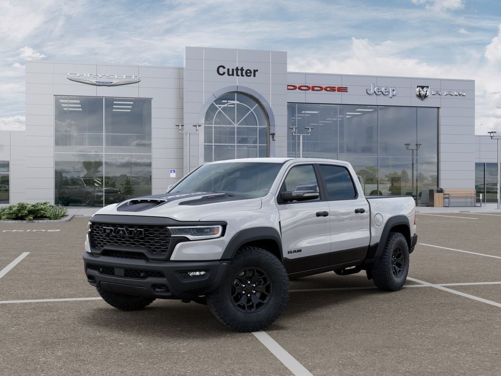 2026 RAM Ram 1500 RAM 1500 RHO CREW CAB 4X4 5'7' BOX in Bright White Clear-Coat Exterior Paint — front three-quarter view