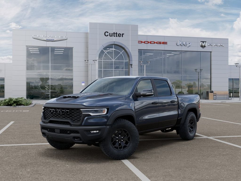 2026 RAM Ram 1500 RAM 1500 RHO CREW CAB 4X4 5'7' BOX in Forged Blue Metallic Exterior Paint — front three-quarter view