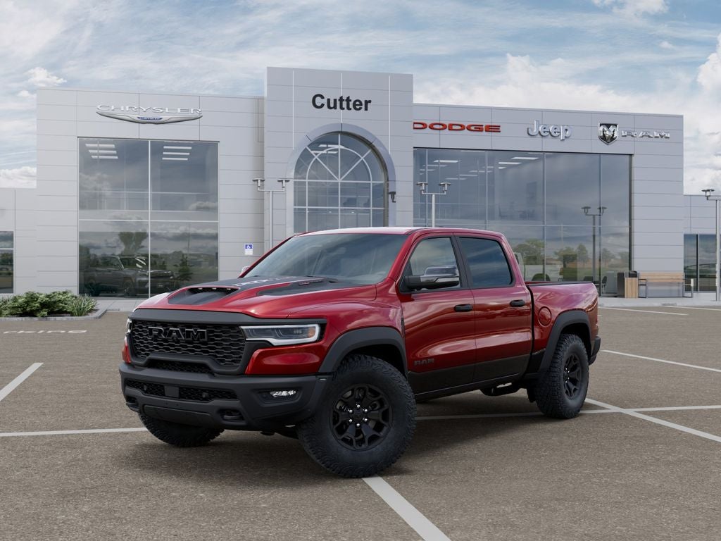 2026 RAM Ram 1500 RAM 1500 RHO CREW CAB 4X4 5'7' BOX in Molten Red Pearl-Coat Exterior Paint — front three-quarter view