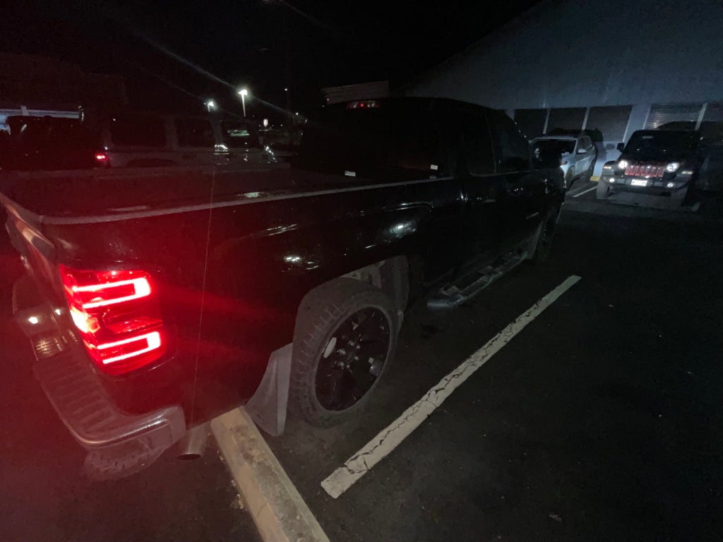 2016 Chevrolet Silverado 1500 1LT in Black — front three-quarter view