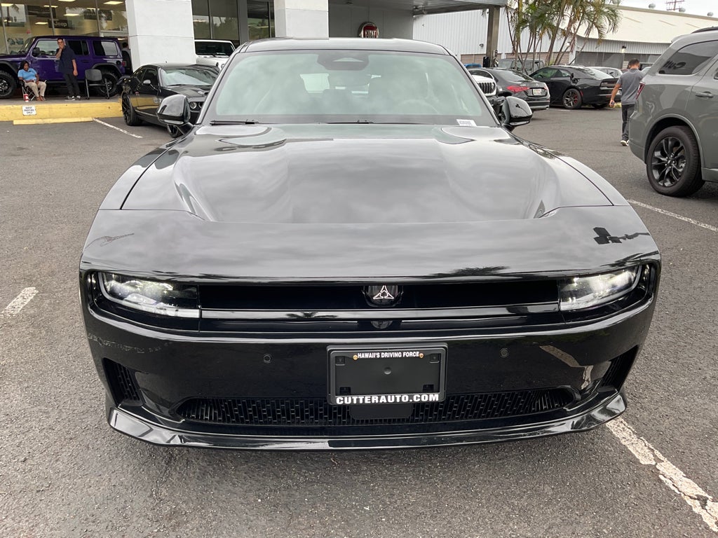 2026 Dodge Charger CHARGER DAYTONA SCAT PACK 4-DOOR AWD in Diamond Black Crystal Pearlcoat — front three-quarter view